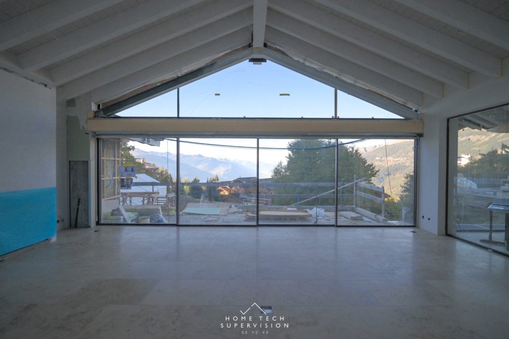 Chalet en cours à Crans-Montana – grande baie vitrée face aux Alpes